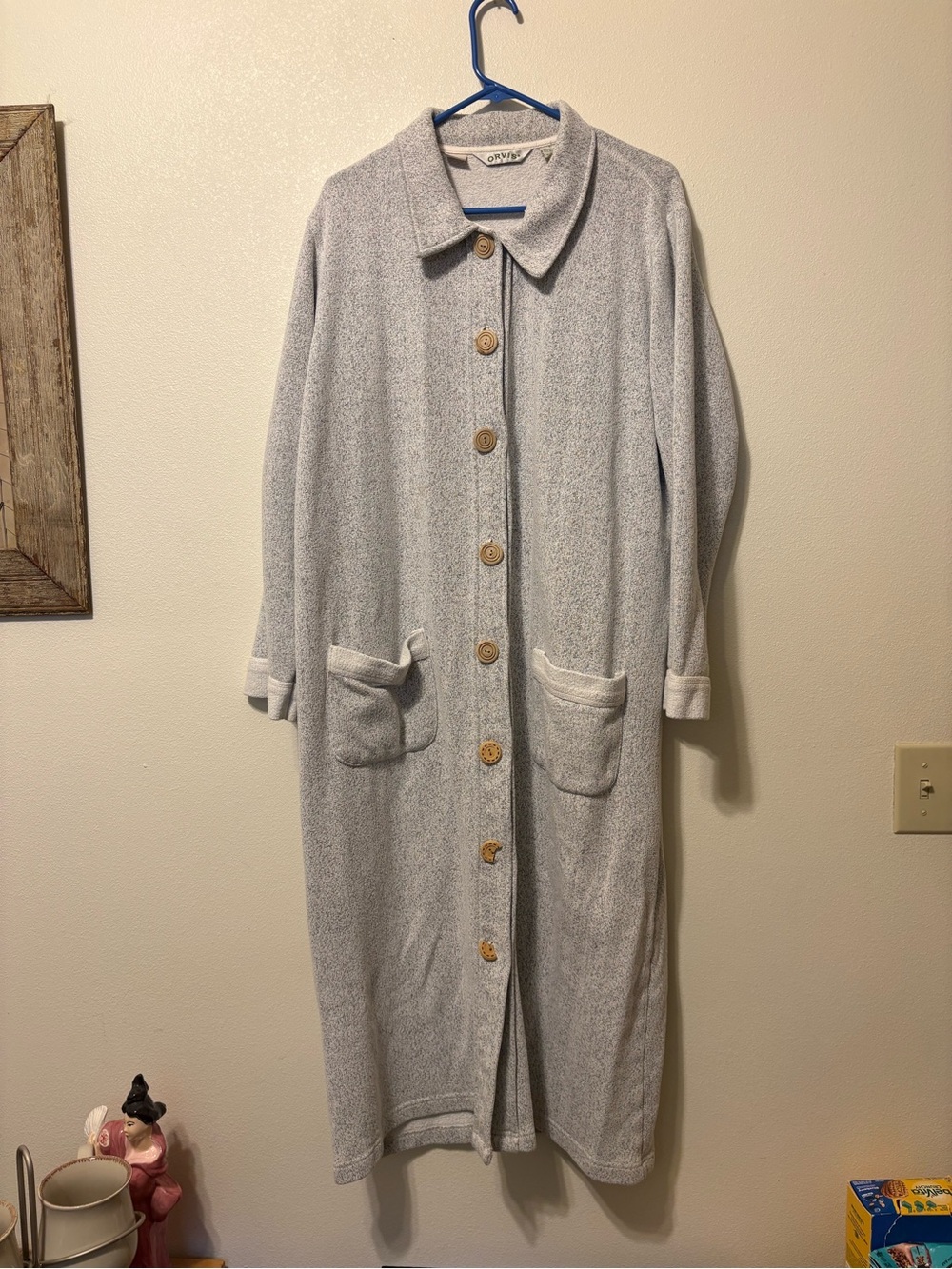 Orvis medium weight cardigan . Two buttons broken, small spot on sleeve